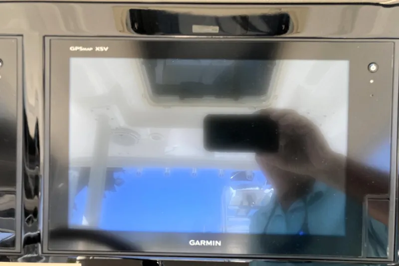 Slide: The Image of Garmin GPSmap XSV display on 2019 Pursuit S 288 Sport boat dashboard. - 33