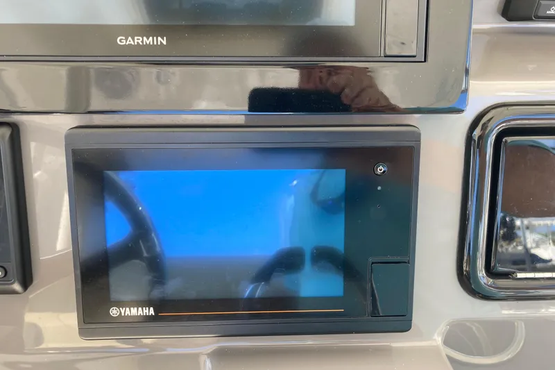 Slide: The Image of Dashboard of 2019 Pursuit S 288 Sport with Garmin and Yamaha displays. - 34