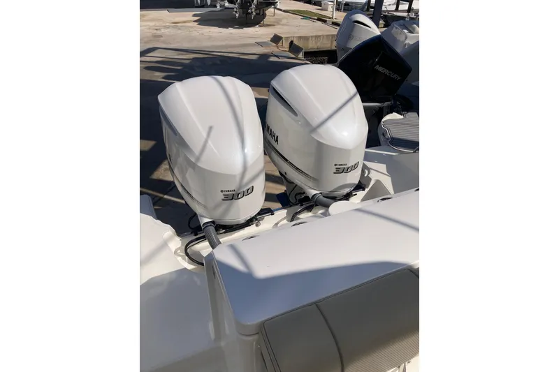 Slide: The Image of Twin Yamaha 300 engines on a 2019 Pursuit S 288 Sport boat. - 60