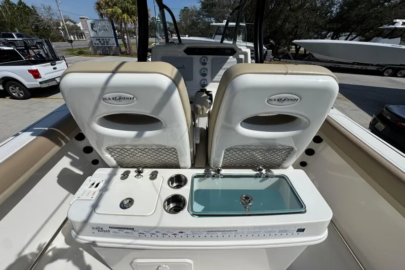 Slide: The Image of 2019 Sailfish 270 CC boat interior with dual seats and fishing station. - 33