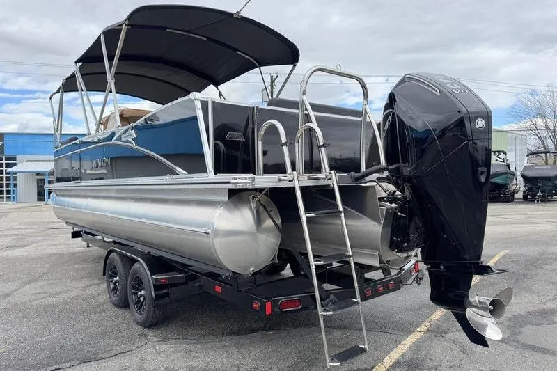 Slide: The Image of 2025 Avalon 2585 25 Catalina ENT pontoon boat with outboard motor and trailer. - 12