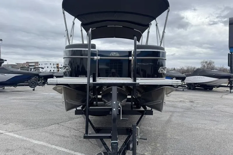 Slide: The Image of 2025 Avalon 2585 25 Catalina ENT pontoon boat on trailer in parking lot. - 5