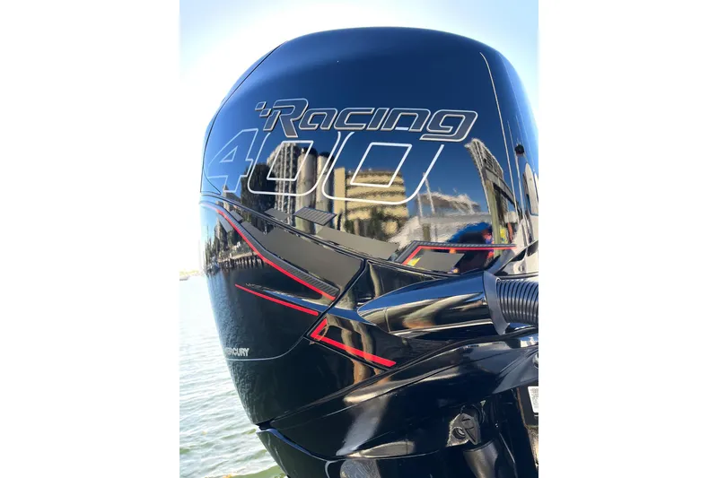 Slide: The Image of Mercury Racing 400 outboard engine on 2023 Renegade 32' Cuddy boat. - 10