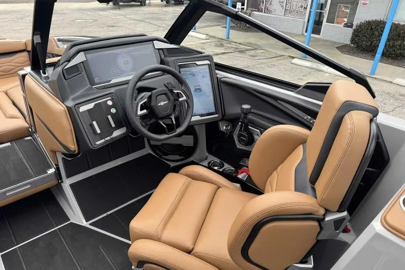 Slide: The Image of 2026 Supra SA boat interior with tan leather seats and advanced dashboard technology. - 5