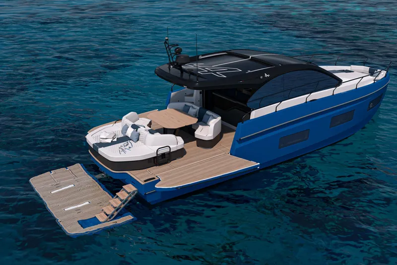 Slide: The Image of 2026 Beneteau Gran Turismo 50 yacht on clear blue water, featuring sleek design and spacious deck. - 18