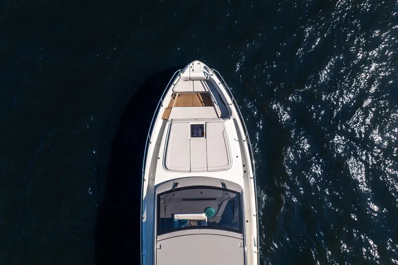 Slide: The Image of Aerial view of 2026 Beneteau Gran Turismo 50 yacht on shimmering water. - 9