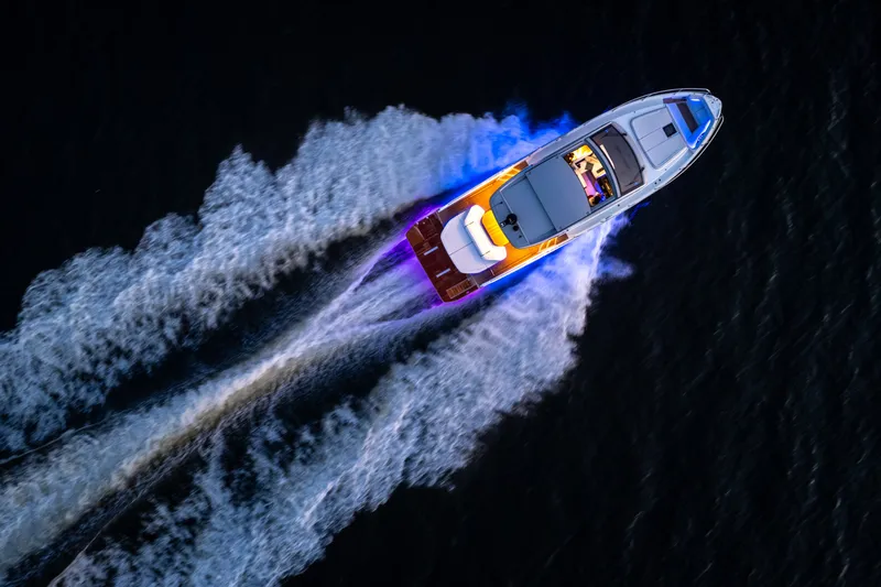 Slide: The Image of Aerial view of 2026 Beneteau Gran Turismo 50 yacht cruising on water. - 1