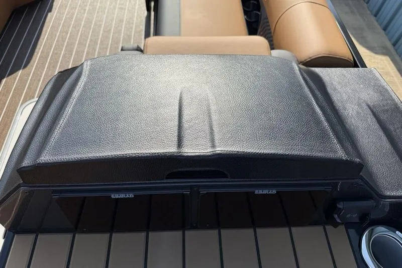 Slide: The Image of 2026 Premier 250 Solaris RF-CL dashboard with leather cover and brown seating. - 24