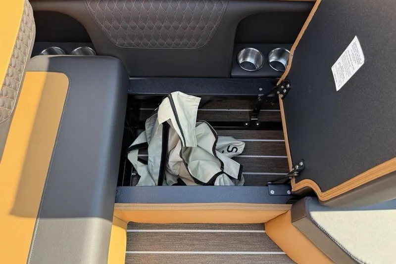 Slide: The Image of Open storage compartment in 2026 Premier 250 Solaris RF -CL boat interior. - 30