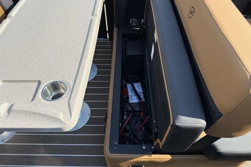 Slide: The Image of 2026 Premier 250 Solaris RF-CL boat interior with storage compartment and seating. - 31