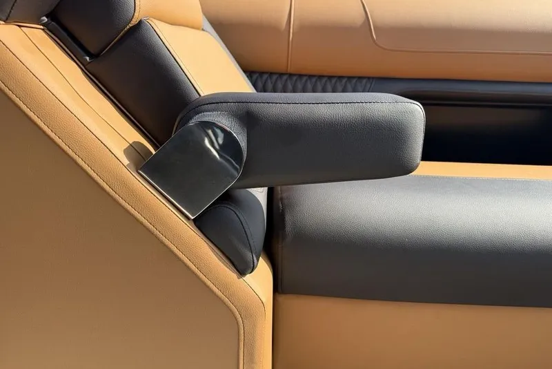 Slide: The Image of Luxurious seating detail of 2026 Premier 250 Solaris RF -CL with tan and black upholstery. - 11