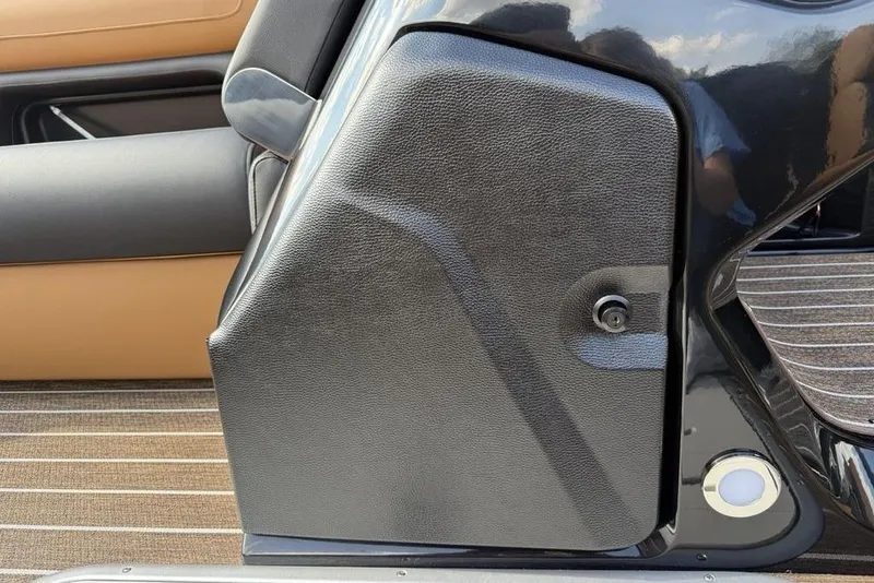 Slide: The Image of 2026 Premier 250 Solaris RF-CL interior detail with sleek black and tan design. - 14