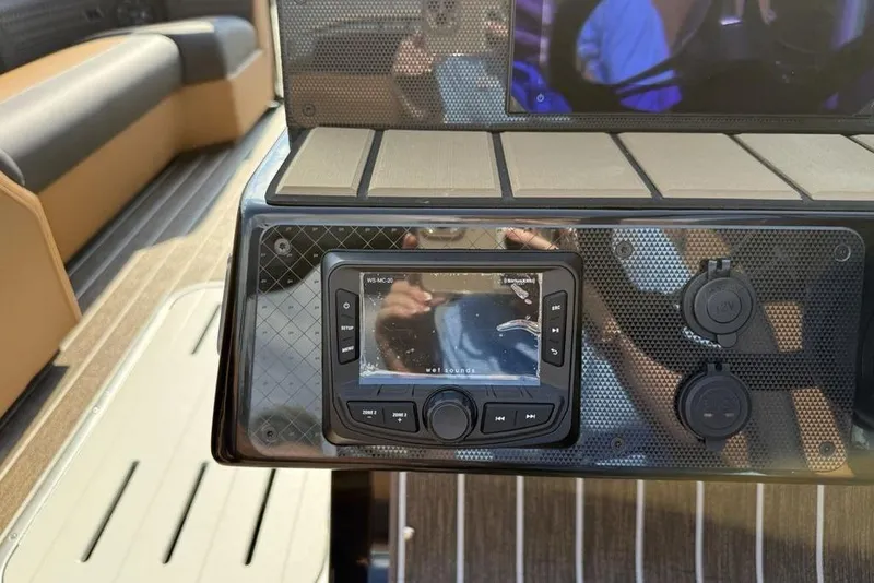 Slide: The Image of Control panel of 2026 Premier 250 Solaris RF -CL boat with audio system. - 19