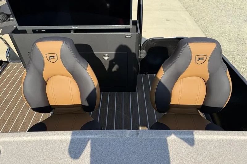 Slide: The Image of Luxury seats in 2026 Premier 250 Solaris RF-CL boat, featuring stylish brown and black design. - 35