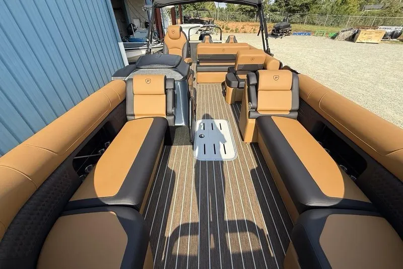 Slide: The Image of 2026 Premier 250 Solaris RF -CL boat interior with luxurious tan and black seating. - 39