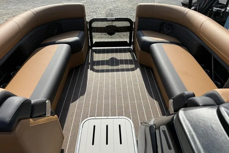 Slide: The Image of 2026 Premier 250 Solaris RF-CL boat interior with luxurious seating and striped flooring. - 4
