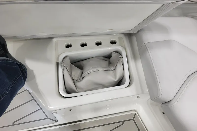Slide: The Image of Interior view of 2026 Formula 430 Super Sport Crossover boat with storage compartment. - 14