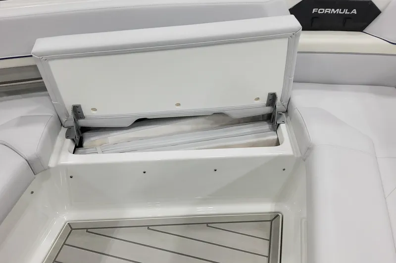 Slide: The Image of Open storage compartment on 2026 Formula 430 Super Sport Crossover boat. - 15
