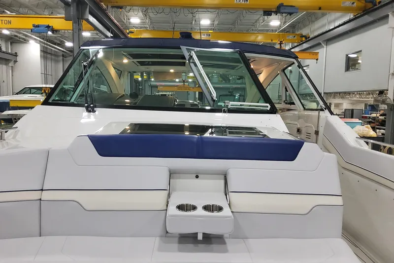 Slide: The Image of 2026 Formula 430 Super Sport Crossover boat interior in a manufacturing facility. - 17