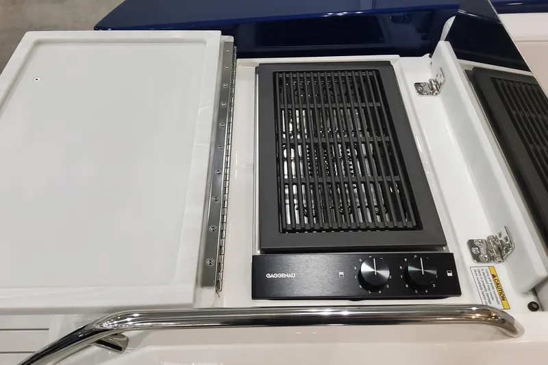Slide: The Image of Built-in grill on 2026 Formula 430 Super Sport Crossover boat, featuring Gaggenau controls. - 29