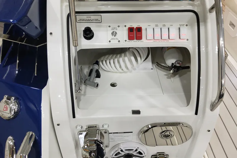 Slide: The Image of Control panel of 2026 Formula 430 Super Sport Crossover boat with switches and equipment. - 30