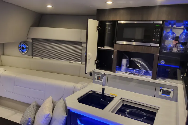 Slide: The Image of Luxurious interior of 2026 Formula 430 Super Sport Crossover yacht with modern kitchen amenities. - 32