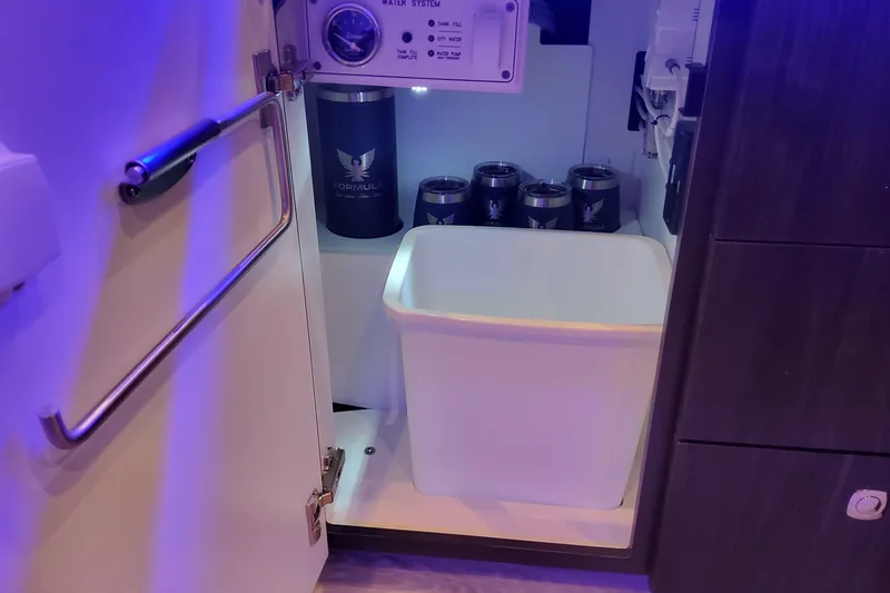 Slide: The Image of Interior of 2026 Formula 430 Super Sport Crossover with storage and water system. - 33