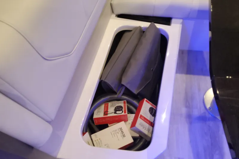 Slide: The Image of Storage compartment in 2026 Formula 430 Super Sport Crossover with accessories and boxes. - 35