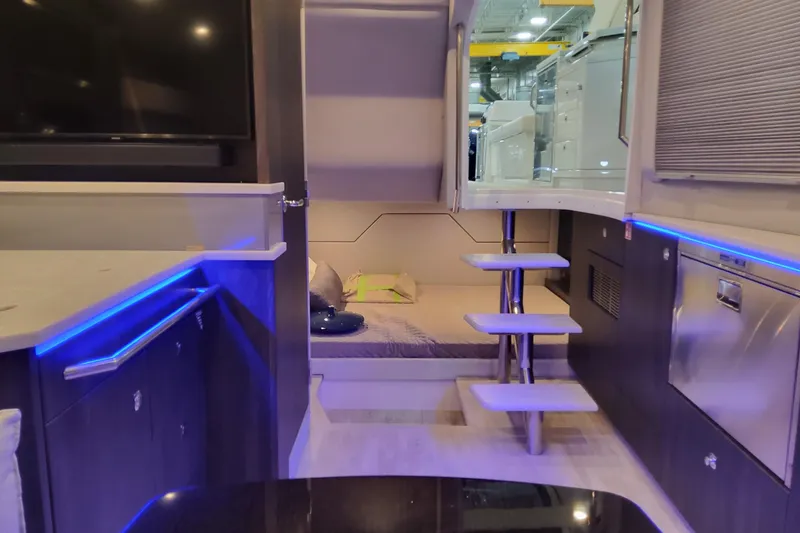 Slide: The Image of Interior of 2026 Formula 430 Super Sport Crossover with modern design and ambient lighting. - 36