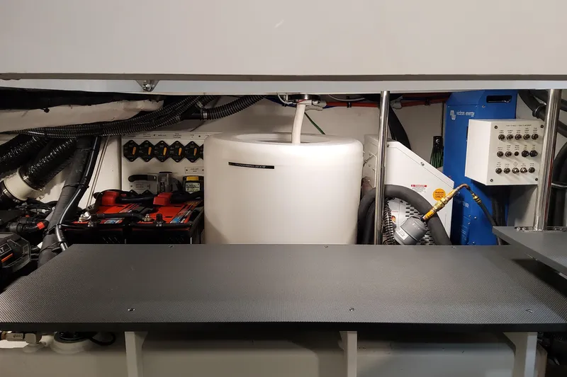 Slide: The Image of Engine room of 2026 Formula 430 Super Sport Crossover with batteries and control systems. - 43