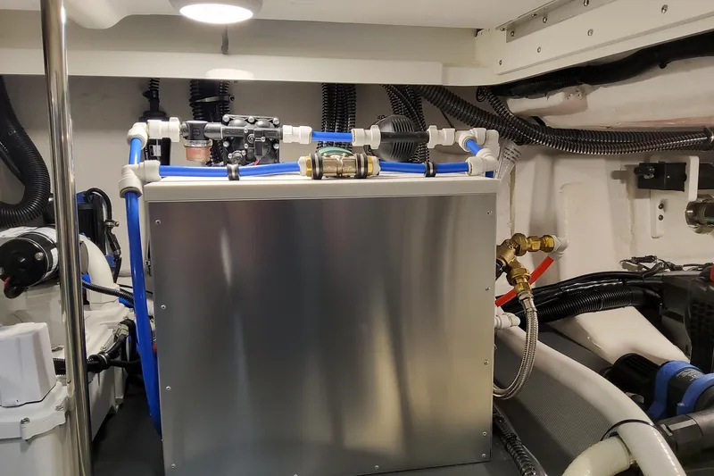 Slide: The Image of Engine room of 2026 Formula 430 Super Sport Crossover with advanced plumbing and wiring systems. - 46