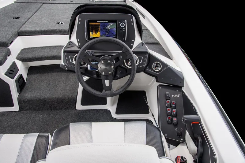 Slide: The Image of Manufacturer Provided Image: 2021 Skeeter ZX 200 boat cockpit with steering wheel and navigation system. - 4