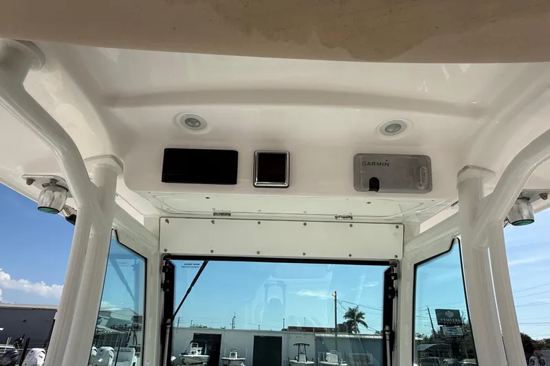 Slide: The Image of Interior view of 2020 Everglades 273 Center Console boat with Garmin electronics. - 12