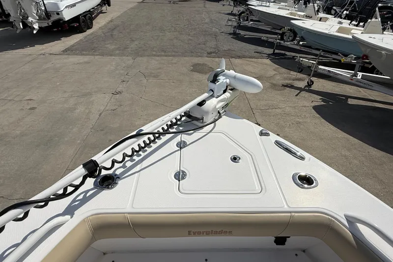 Slide: The Image of Bow view of 2020 Everglades 273 Center Console boat at a marina. - 15