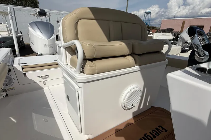 Slide: The Image of 2020 Everglades 273 Center Console boat with beige seating and Yamaha 300 engine. - 17