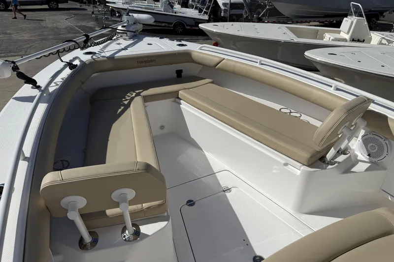 Slide: The Image of 2020 Everglades 273 Center Console boat with beige seating and modern design. - 31