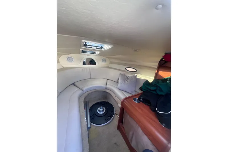 Slide: The Image of Interior of 2007 Rinker 230 Captiva Atlantic boat with seating and storage. - 17
