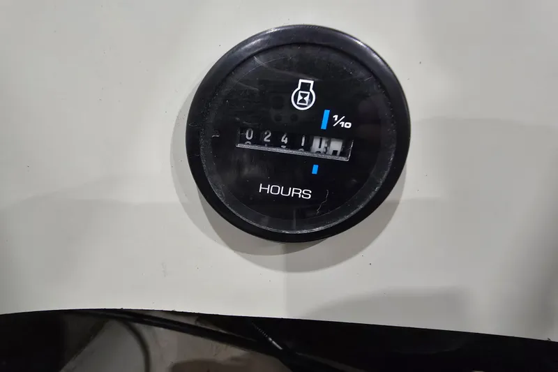 Slide: The Image of Hour meter on 2004 Larson LXi 190 boat dashboard, displaying 241.1 hours. - 19