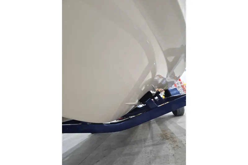 Slide: The Image of 2004 Larson LXi 190 boat hull on trailer, close-up view. - 33