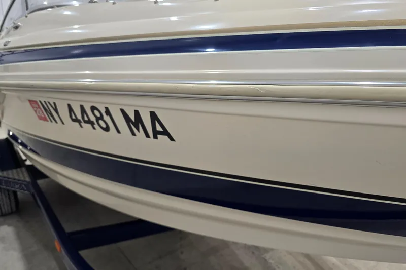 Slide: The Image of 2004 Larson LXi 190 boat with registration NY 4481 MA, side view. - 7