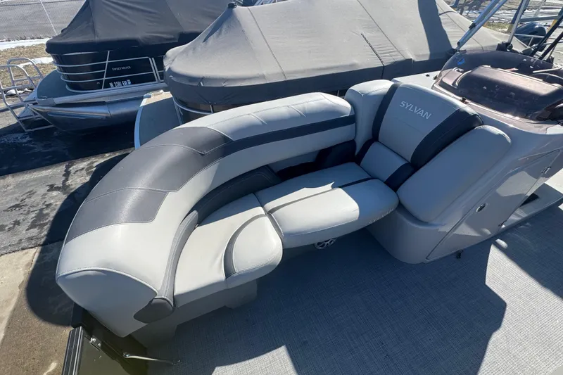 Slide: The Image of 2025 Sylvan L3 DLZ boat with luxurious seating and sleek design. - 4
