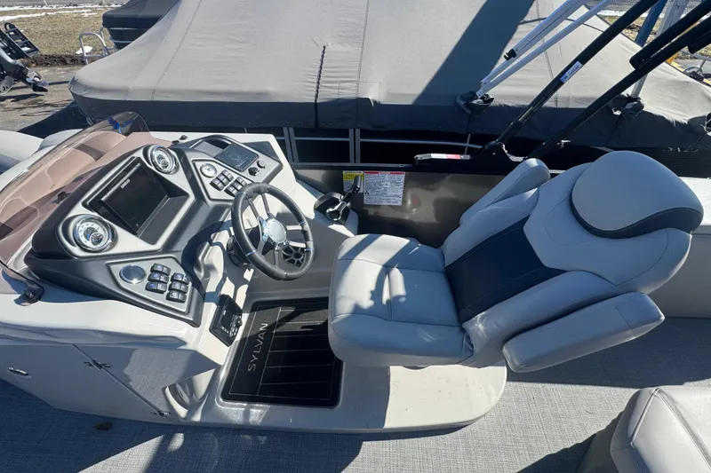 Slide: The Image of 2025 Sylvan L3 DLZ boat cockpit with modern steering and controls. - 6