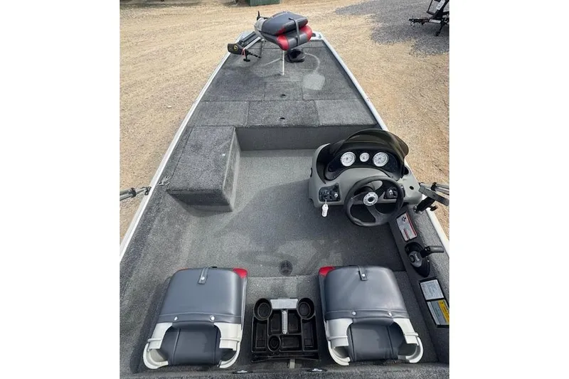 Slide: The Image of 2015 Tracker Pro 170 boat interior with steering console and seating. - 12
