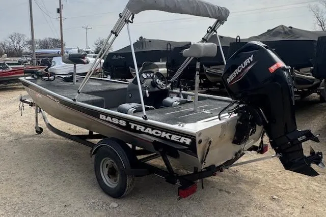 Slide: The Image of 2015 Tracker Pro 170 bass boat with Mercury outboard motor on trailer. - 7