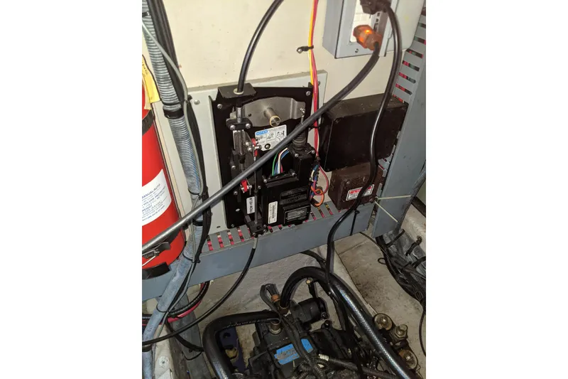 Slide: The Image of Engine compartment wiring of 2004 Sea Ray 380 Sundancer with fire extinguisher. - 27