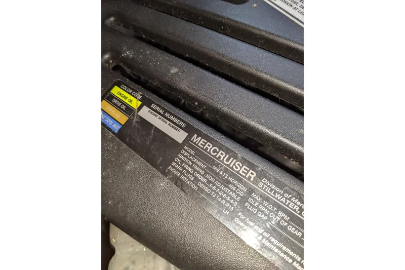 Slide: The Image of Engine label of 2004 Sea Ray 380 Sundancer, featuring MerCruiser specifications and serial numbers. - 31