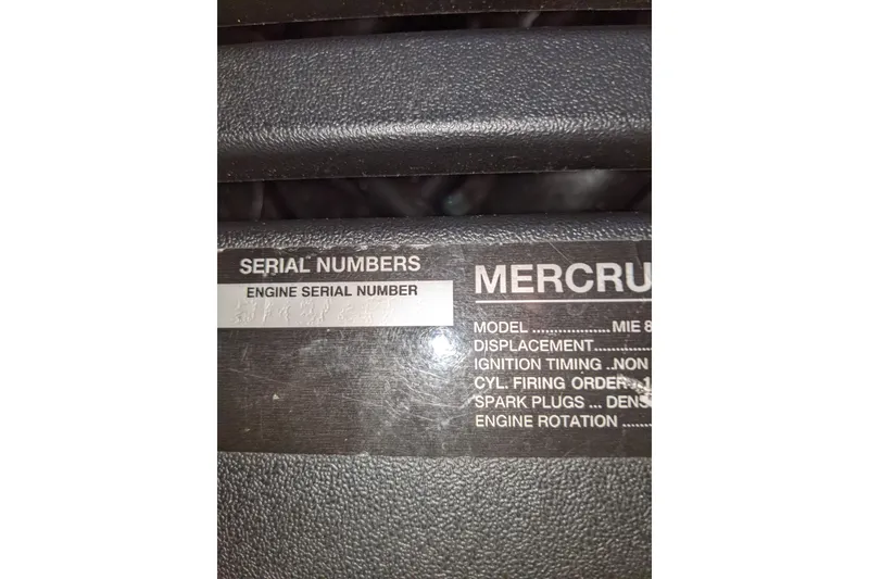Slide: The Image of Engine serial number label on 2004 Sea Ray 380 Sundancer boat. - 32