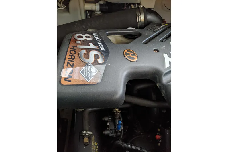 Slide: The Image of Engine of 2004 Sea Ray 380 Sundancer, featuring MerCruiser 8.1S Horizon. - 33