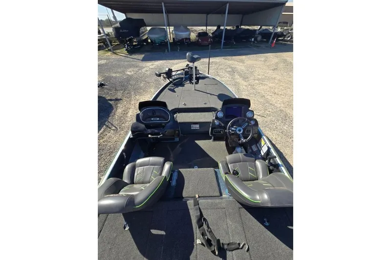 Slide: The Image of 2018 Nitro Z18 Tracker boat interior with dual seats and steering console. - 4