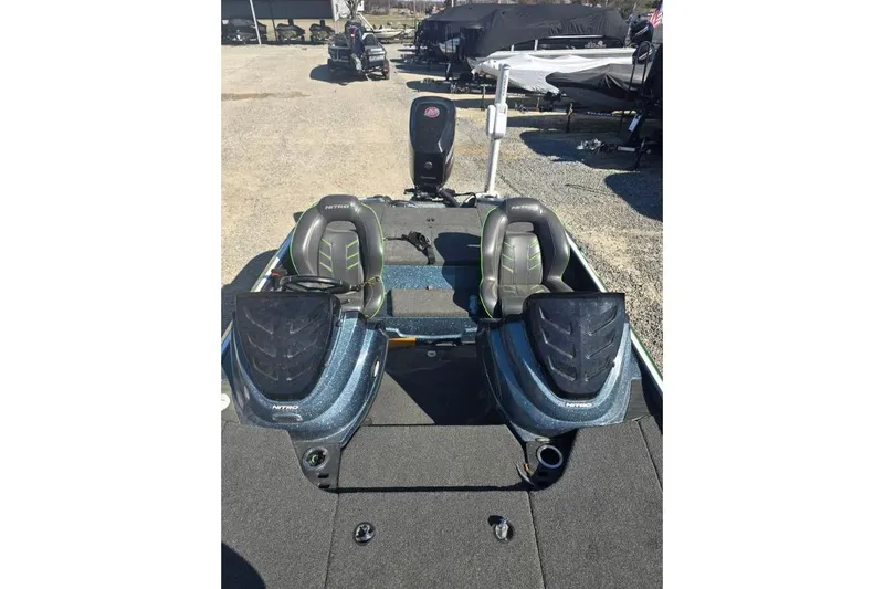 Slide: The Image of 2018 Nitro Z18 Tracker boat interior with dual seats and console. - 5